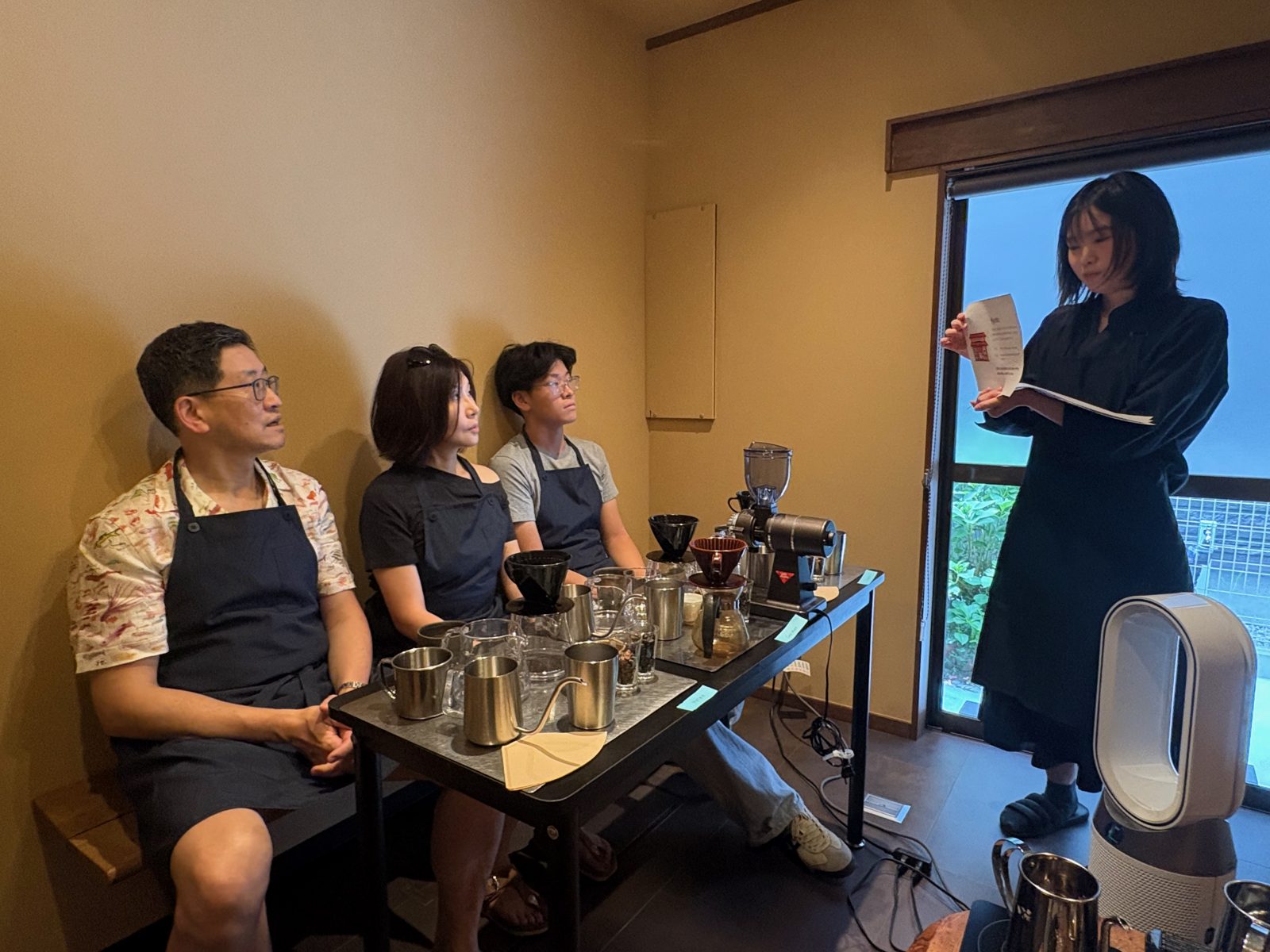 The Master sharing the story of Japanese coffee with the group